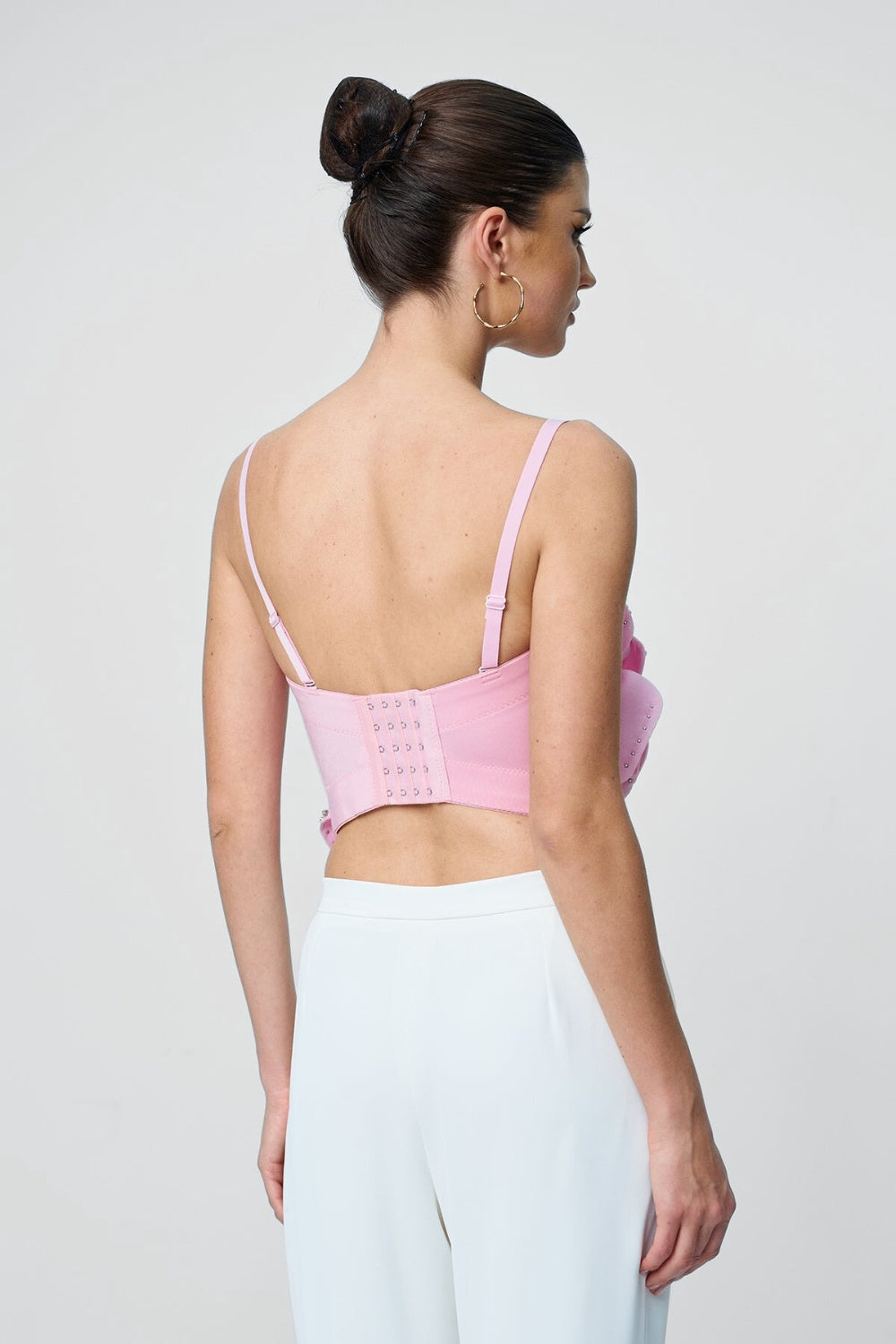 Gorsetowy top z kwiatową aplikacją i cienkimi ramiączkami zdobiony kryształkami