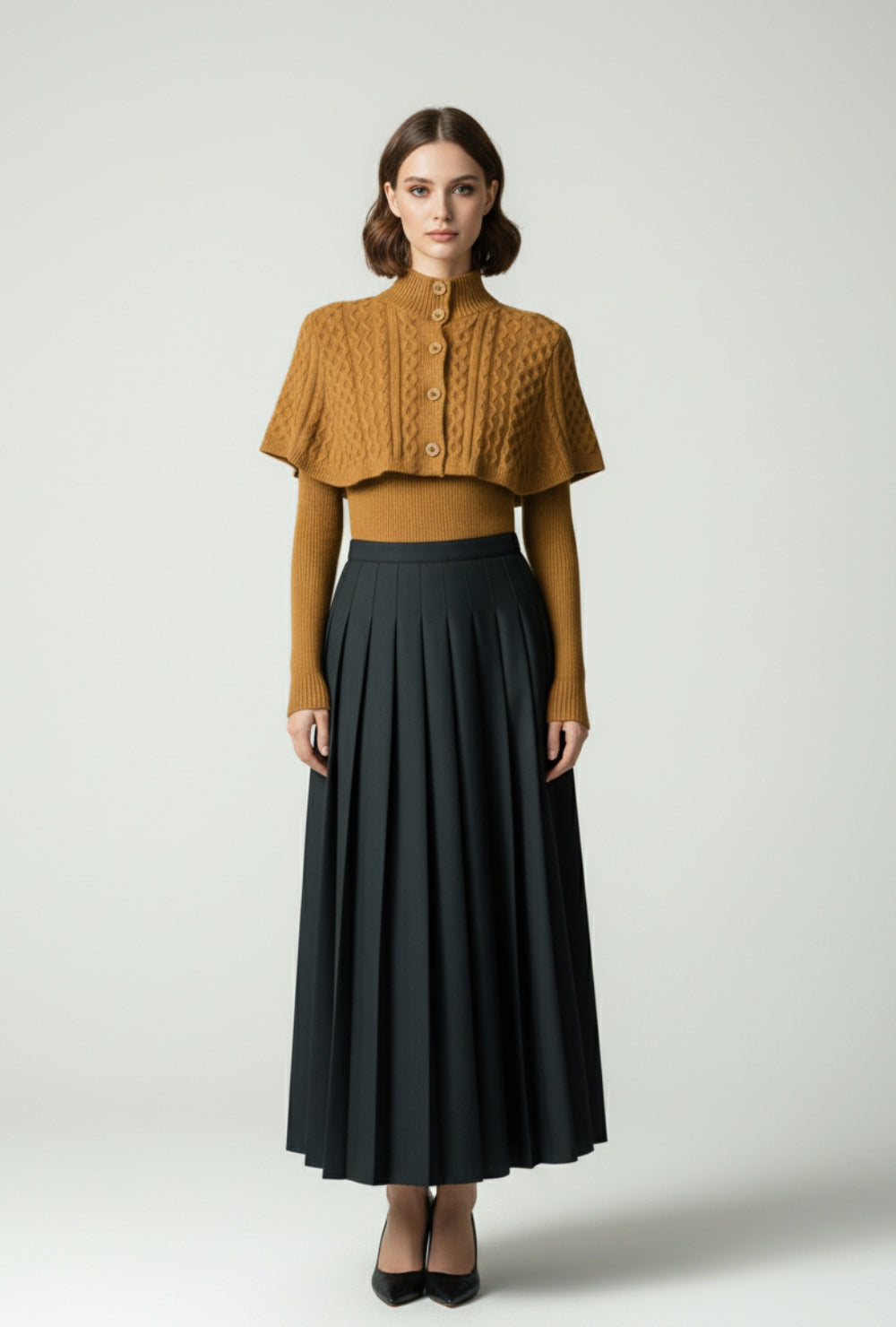 Sweter z golfem i krótką narzutką o splocie warkoczowym