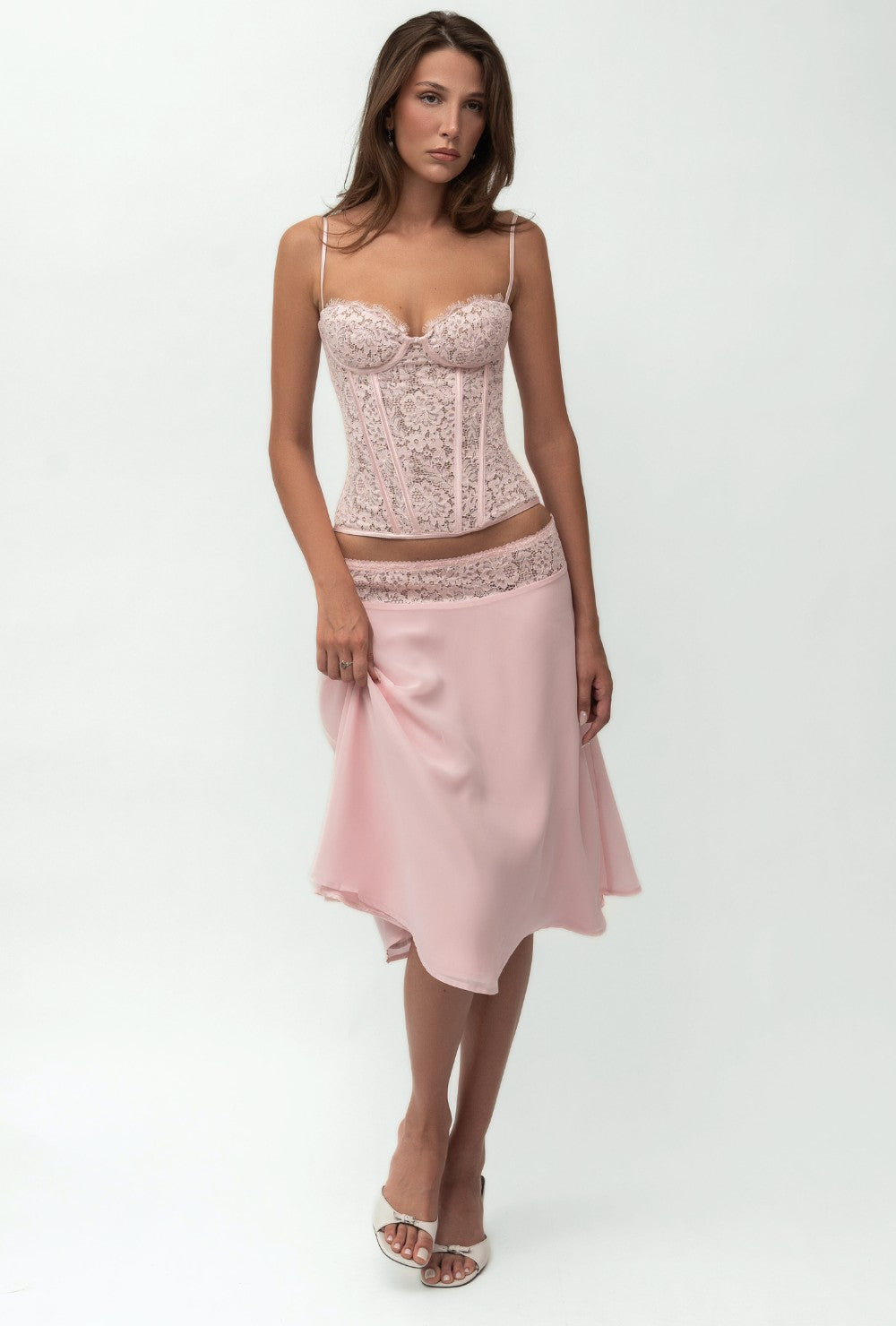 Krótki top gorsetowy z różowej koronki z fiszbinami i regulowanymi ramiączkami