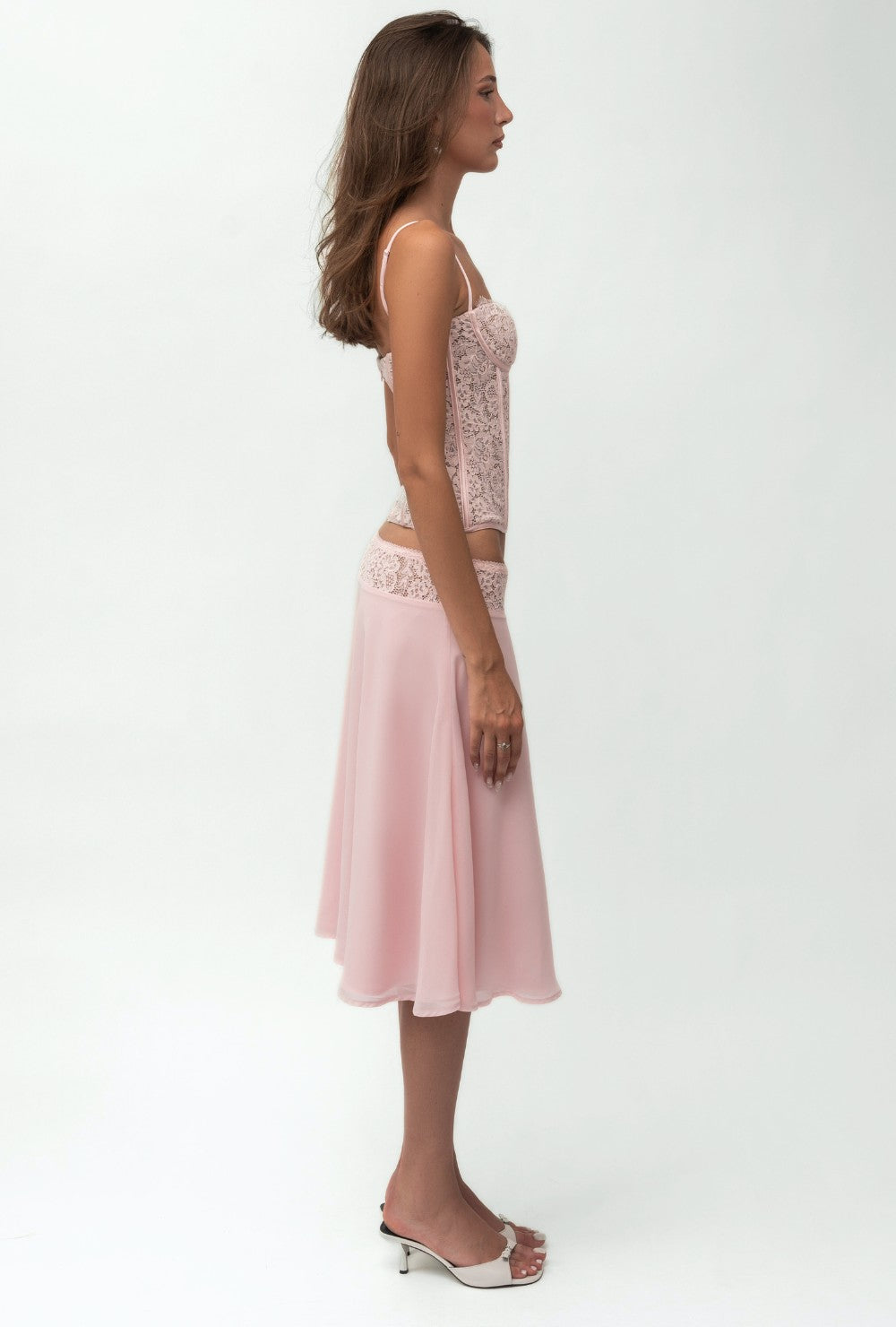 Krótki top gorsetowy z różowej koronki z fiszbinami i regulowanymi ramiączkami