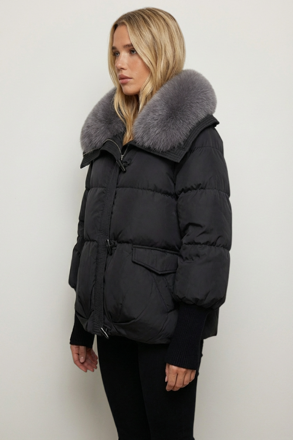 Kurtka zimowa oversize pikowana z dużym kołnierzem ze sztucznego futra i regulacją dołu
